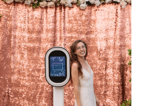 Why a Photo Booth Is Still the Star of Every Long Island Event in 2026 1 Girl enjoying a photo booth rental for a Sweet 16 on Long Island